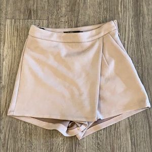 Pink suede envelope skirt